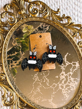 Load image into Gallery viewer, Mothman Earrings | Layered Acrylic Cryptid Pop Culture Jewelry
