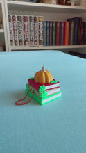 Load and play video in Gallery viewer, Fall Book Stack Fidget Clicker | 1-Click Keychain Desk Toy
